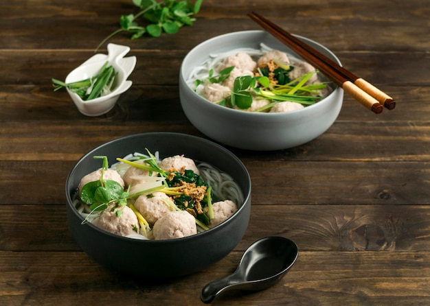 Free photo high angle delicious bakso bowl composition