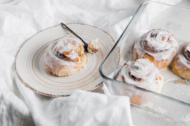 Free photo high angle of delicious cinnamon rolls concept