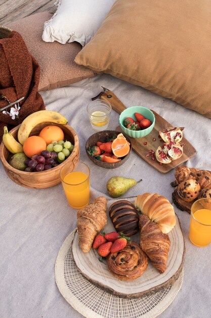 High angle delicious croissants and fruits