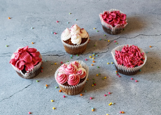 Free photo high angle of delicious cupcakes concept