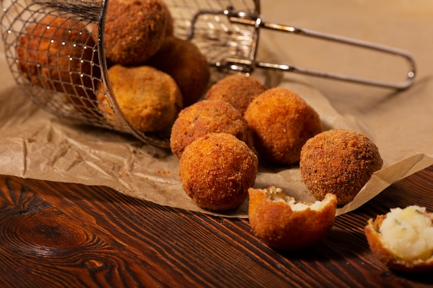 Free photo high angle delicious food croquettes