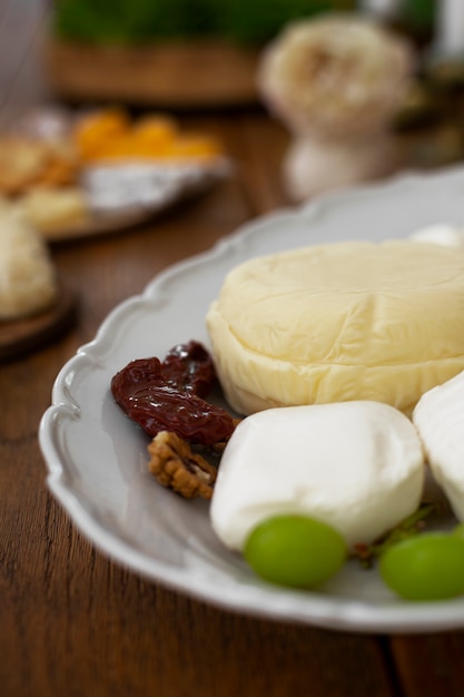 Free photo high angle delicious fresh cheese on table