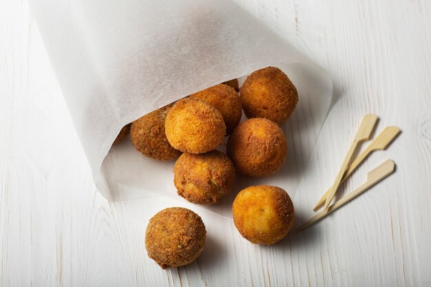 High angle delicious fried food croquettes