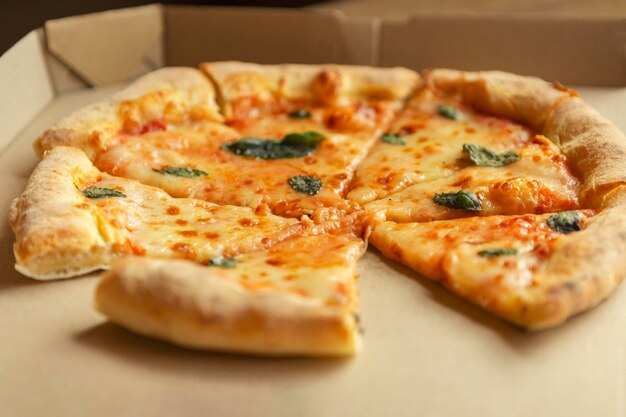 High angle delicious pizza in box