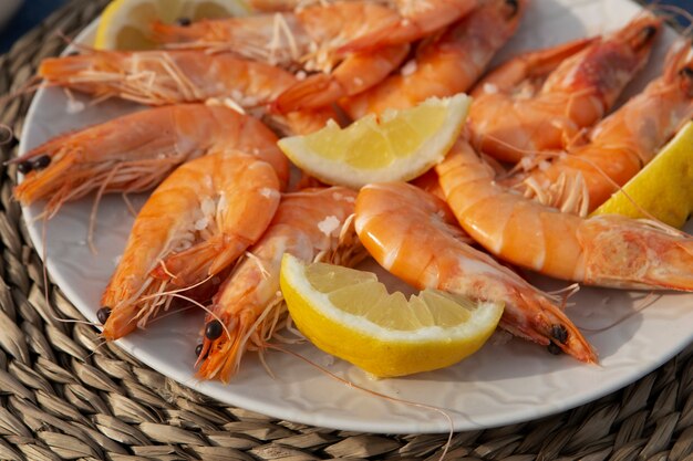 High angle delicious shrimp and lemons