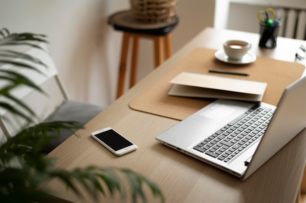 High angle desk arrangement with laptop