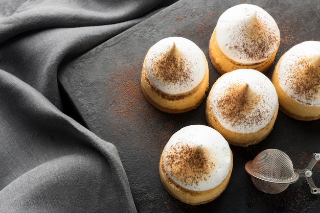 High angle of desserts on slate