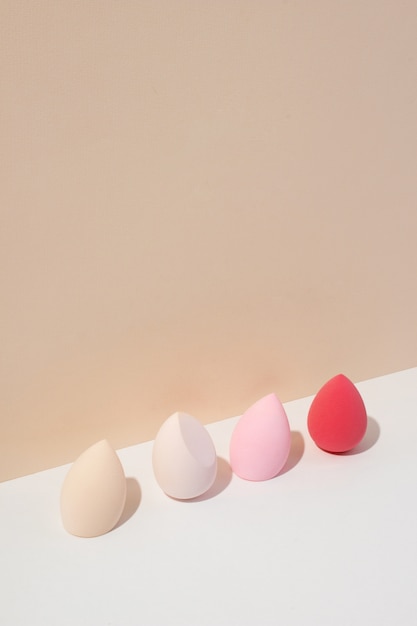 Free photo high angle different beauty blenders arrangement