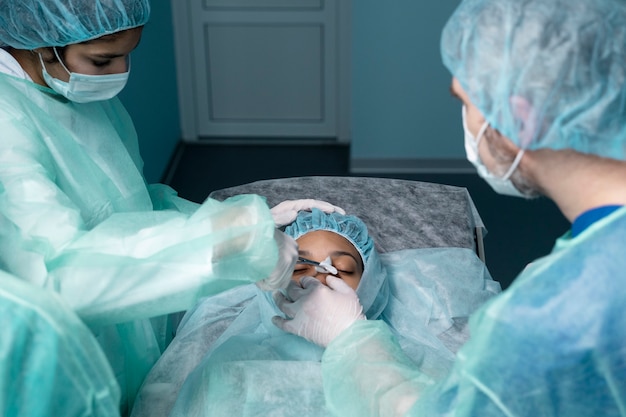 High angle doctors in operating room