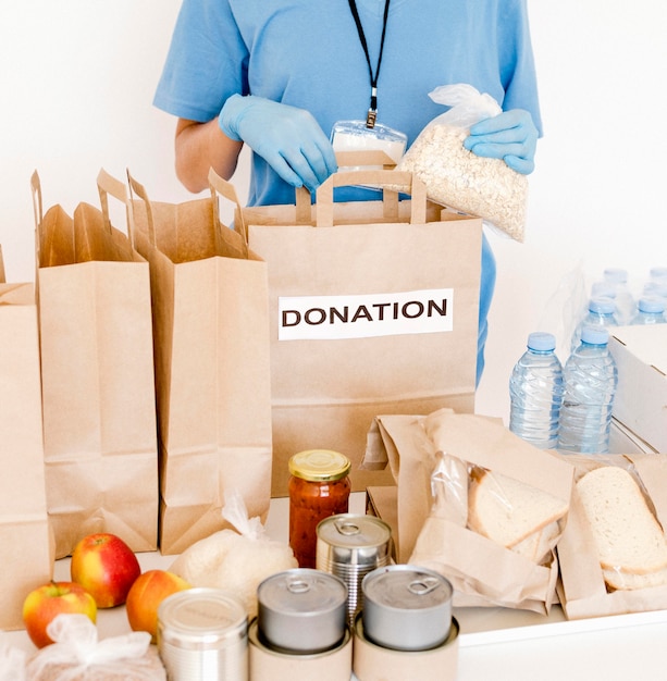 High angle of donation bags with provisions