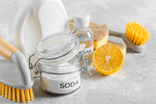 High angle of eco-friendly cleaning brushes with baking soda and lemon
