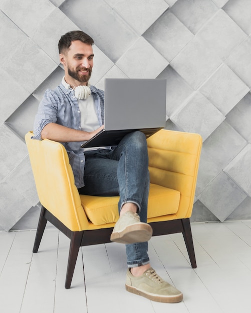 High angle employee on break with laptop