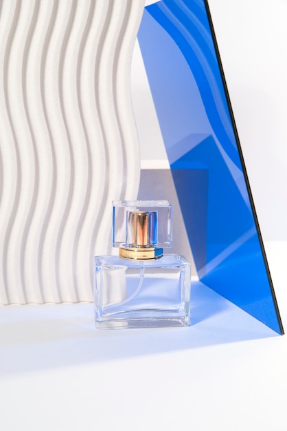 Free photo high angle empty perfume bottle