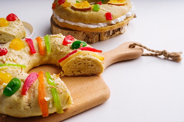 High angle of epiphany day desserts on chopping board