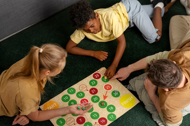 High angle family members playing game