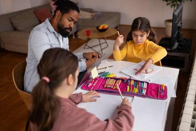 High angle family spending time at home