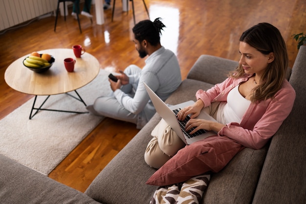 High angle family spending time at home