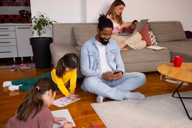 High angle family spending time at home
