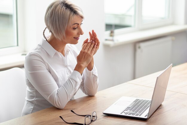 High angle female at office working