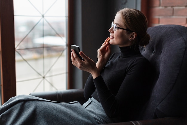 High angle female talking at phone