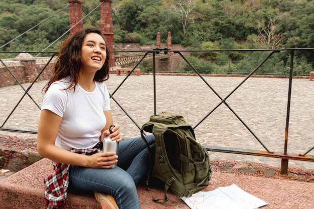 High angle female traveler on break