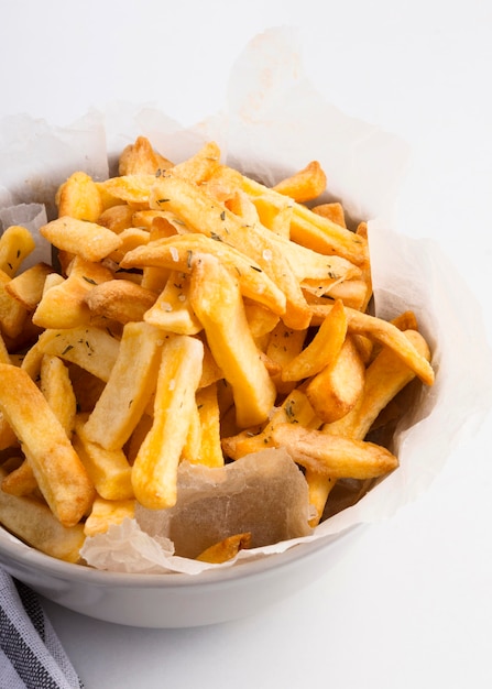 Free photo high angle of french fries in bowl with copy space