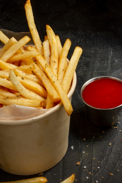 High angle french fries and sauce