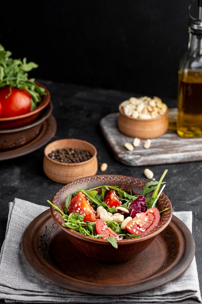 High angle fresh salad in brown bowl