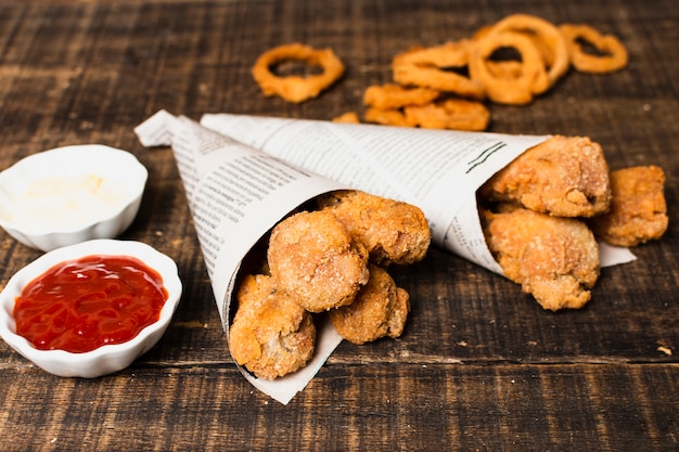 Free photo high angle of fried kitchen with ketchup