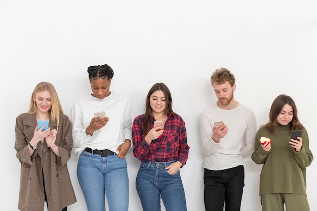 High angle friends with phones