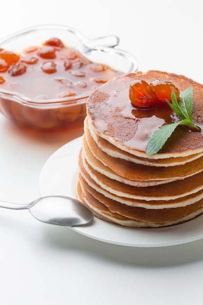 High angle fruit jam with pancakes