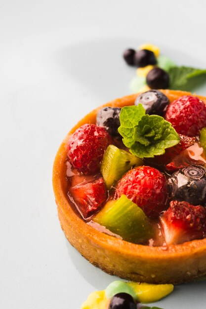 High angle fruit tart on plate