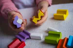 Free photo high angle girl playing memory game