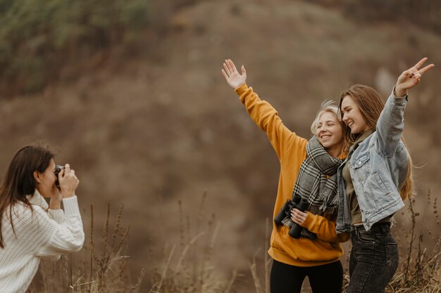 High angle girlfriends taking photos