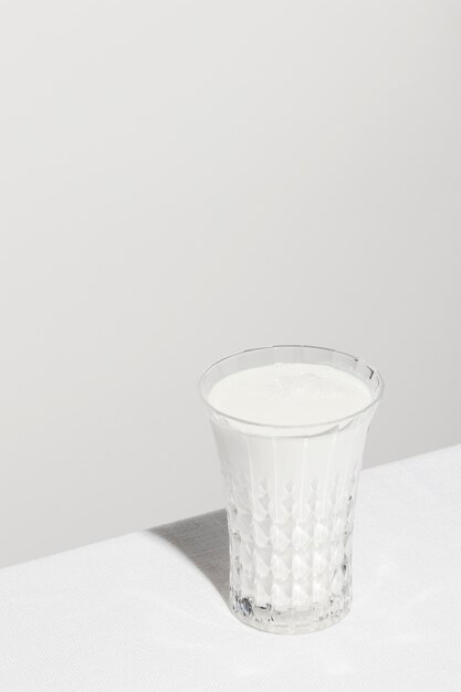 High angle of glass of milk with copy space