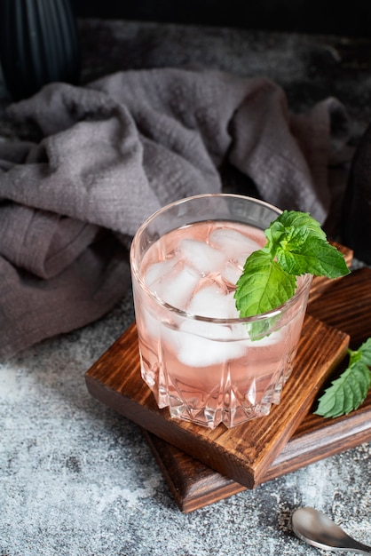 High angle glass with sake and ice