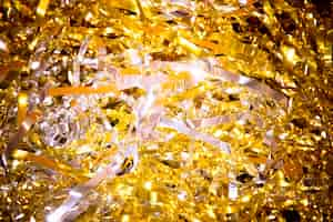 Free photo high angle golden confetti for new year party