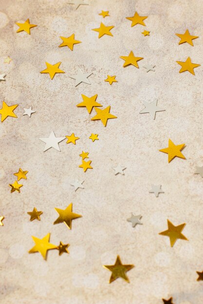 high angle golden stars ornaments on table
