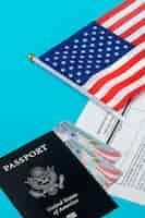 Free photo high angle green card and passport