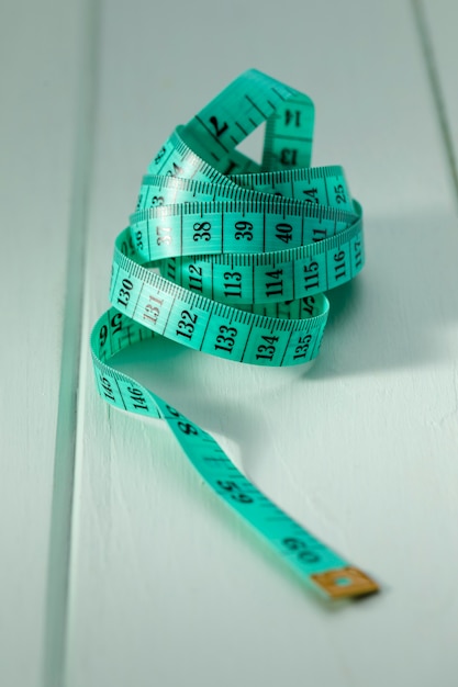 High angle of green measuring tape
