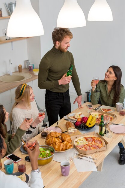 High angle group of friends eating