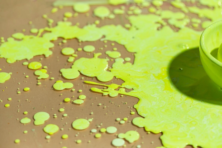 Free Photo high angle half bowl with green paint
