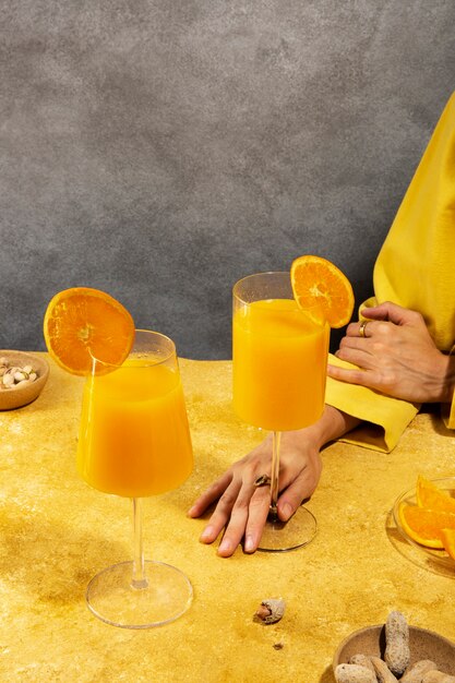 high angle hand holding daiquiri cocktail glass