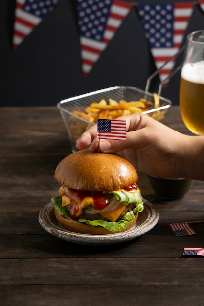 Free photo high angle hand holding usa flag