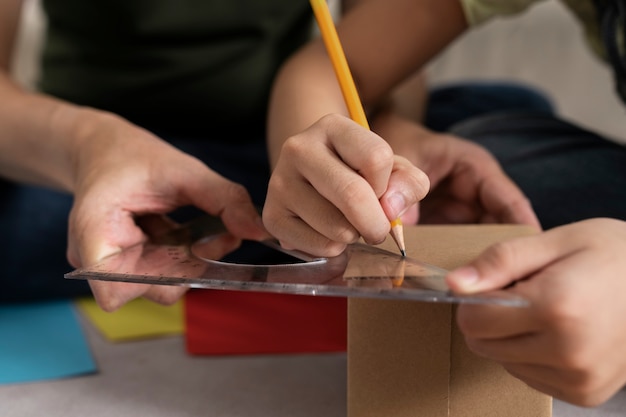 High angle hand measuring with ruler