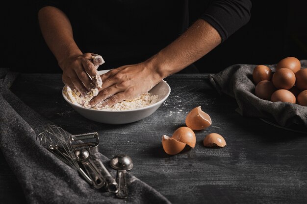 High angle hand mixing dough