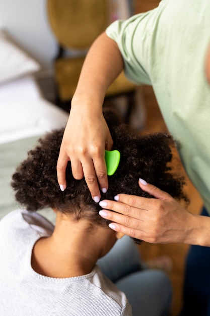 High angle hands combing hair