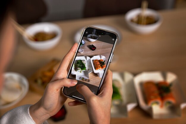 high angle hands holding smartphone
