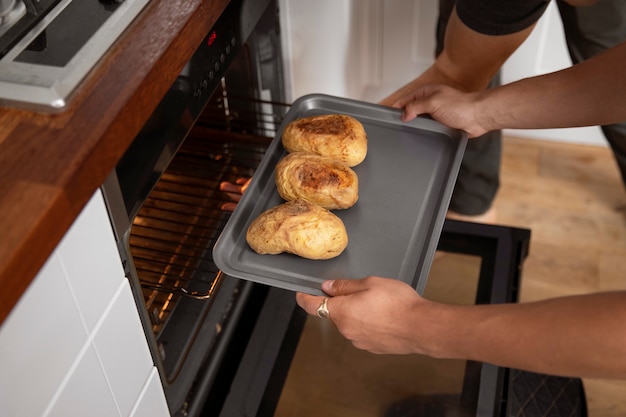 High angle hands holding tray