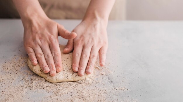 High angle hands making bread